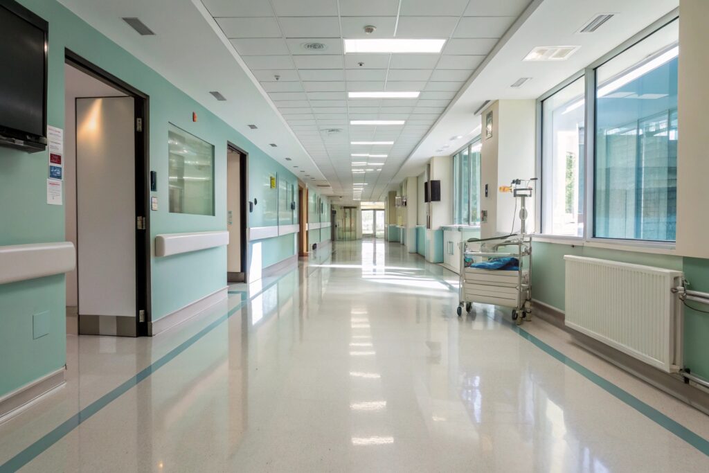Clean hospital corridor with seamless epoxy flooring in Toowoomba medical facility